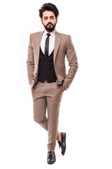 Full length shot of a happy handsome young egypt businessman wearing suit and black tie, isolated...