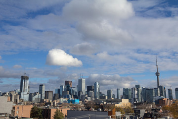 Toronto skyline, with the iconic towers and buildings of the Downtown and the CBD business skyscrapers taken from afar. Tonroto is the main city of Ontario and Canada, and an American finance hub