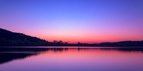 Fototapeta premium sunrise over the lake