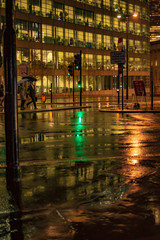 Naklejka na ściany i meble The reflection in wet streets of london during the night and rain