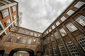 Old historical factory with brick walls and windows in Oisterwijk, Noord Brabant, Netherlands