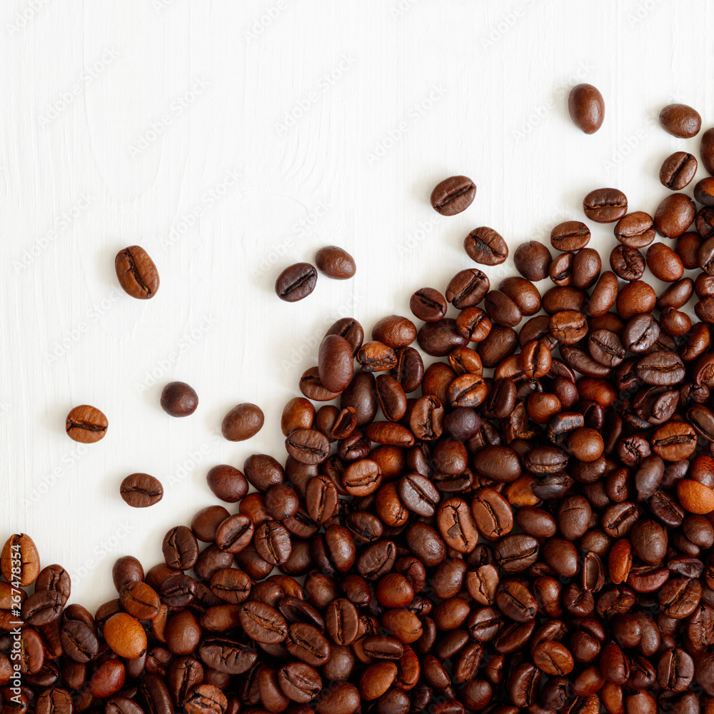 Poster Coffee  beans isolated on white background with copyspace for text. Coffee background or texture concept.