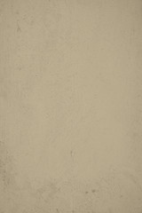 Beige Pastelfarben mit groben Strukturen verputzte Betonwand im Industrial Design. Gestalterisches Element in Pastellfarben als Hintergrund und f&uuml;r Kunstvolle Kollagen. Strukturwand als Tapete und Kun