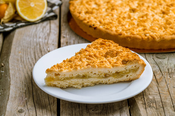 Lemon pie on wooden background
