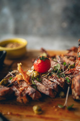 Ribeye steak on a wooden board