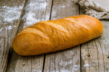 white bread on wooden background