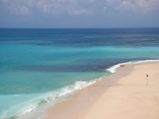 beach with waves in island of Bali 