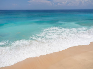 beach with waves in island of Bali 