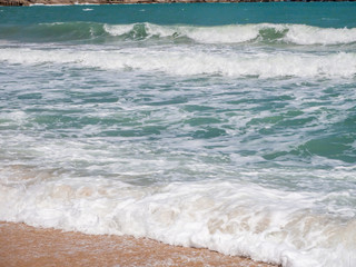 beach with waves in island of Ko Phangan, Thailand