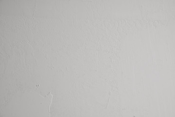 Graue Betonwand mit verputzten Strukturen und verschmutzungen im Industrial Design. Pastellfarbene Steinwand mit als Hintergrund und Gestalterisches Element für kunstvolle Kollagen. Strukturierte Wand