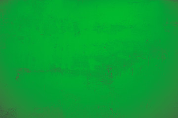 grüne, verputzte Wand als Hintergrund. Steinwand, Betonwand im Industrial Style. Verschmutzte  und raue Strukturen über das ganze Bild. 