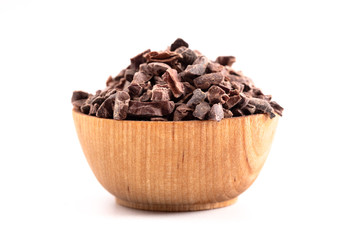 Bowl of Chocolate Nibs Isolated on a White Background