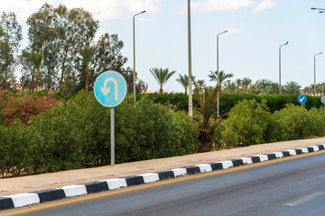 blue road sign reversal full frame