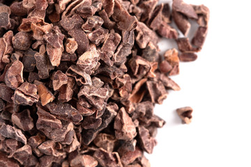 Pile of Raw Chocolate Nibs on a White Background