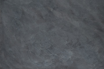 Dark grey textured background. High resolution image with copy space