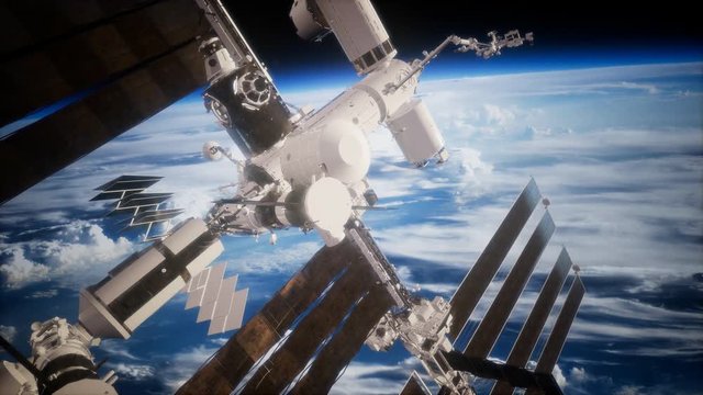 International Space Station in outer space over the planet Earth. Elements of this image furnished by NASA.
