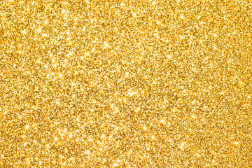 sparkles of golden glitter abstract background	