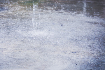Obraz na płótnie Canvas Heavy raining. Raindrops at outdoors. Spring rain. Autumn rain season.