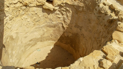 close up of a water cistern at qumran, israel