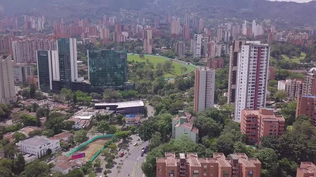 Aerial tilting shot revealning Aguacatala glorieta in Medellin, Antioquia Colombia
