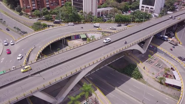 Tilting shot of Aguacatala and Medellin city center in summer day
