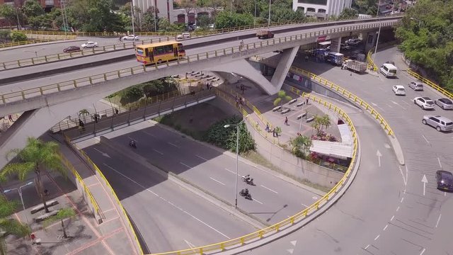 Ascending fast aerial 4k shot of Envigado and Aguacatala roundabout in Medellin, Colombia