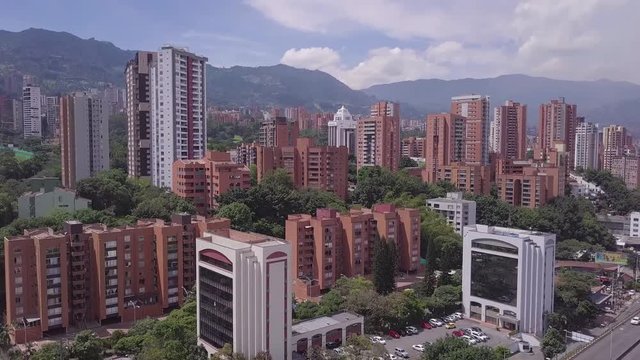Beautiful tilting shot of Envigado and glorieta Aguacatala in Medellin, Colombia