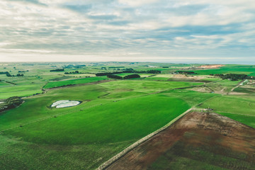 Fototapeta na wymiar Agricultural land at sunset - aerial view