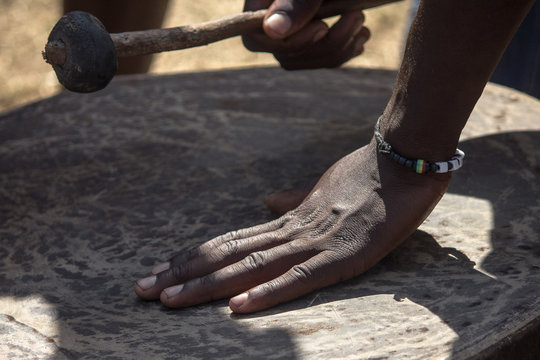 Traditional African drum from being played with drum stick mallet