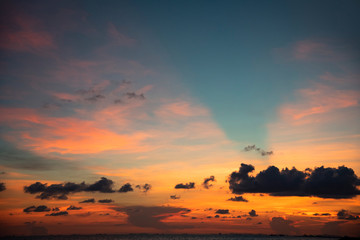 Beautiful sky sunset silhouette cloud  colorful orange and blue dramatic sky background on tropical sea summer