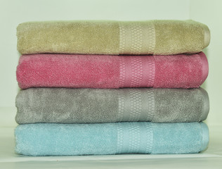 Soft cotton terry towel set. Towel isolated on white. 