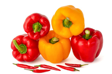 Delicious ripe sweet delicious Bulgarian and Chile peppers in red on a white background