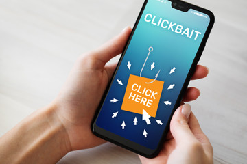 Clickbait, advertising, spam icons on mobile phone screen. Internet and business concept.