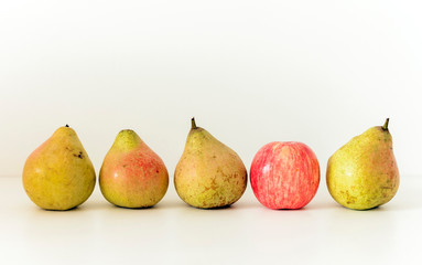 Fresh ripe pears on white background, vegetarian concept.
