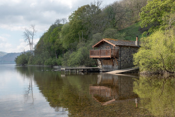 Fototapeta na wymiar The boathouse on Ullwater Lake in the Lake District