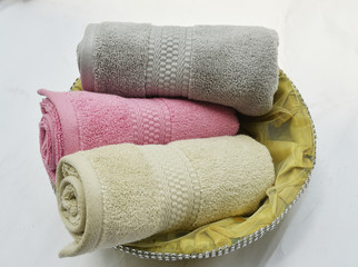 Soft cotton terry towel in the basket