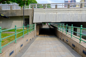 Walking through the Saiboo Street Bridge on the Singapore River Can walk along the river for several kilometers