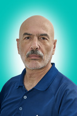 Portrait of Handsome Bald Mature Man on Color Background