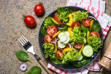 Fresh vegetables salad top view.