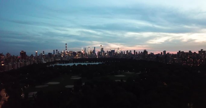 Aerial footage of Central park and Manhattan at dusk