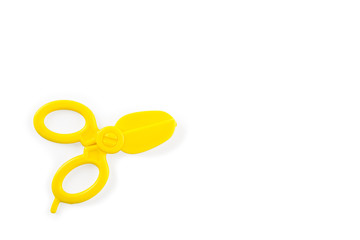 yellow baby scissors isolated on whtie background