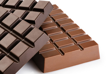 Milk and dark chocolate bars isolated on white background.