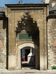 Entrance / gate to old historical mosque in sarajevo, decorated with traditional islamic decorations