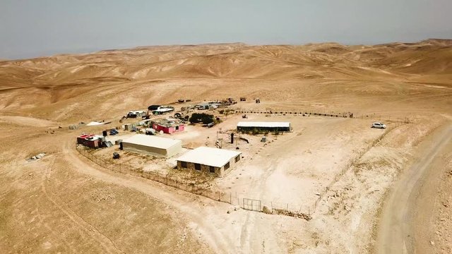 180&rsquo; Aerial view of a campsite in the desert