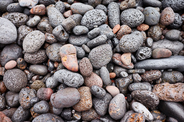 Natural background made of pebbles and volcanic rocks.