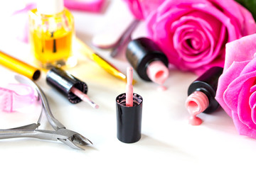 Obraz na płótnie Canvas Concept Nails care background. Manicure, pedicure beauty salon, pink polish.