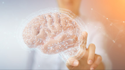 Businesswoman using digital 3D projection of a human brain 3D rendering
