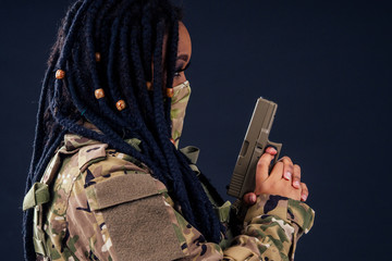 afro american indian army latin soldier in camouflage clothes hair dreadlocks evening makeup in...