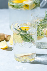 Detox infused water with lemon, ginger and rosemary