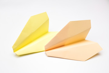 Colorful paper plane on white background, Business competition concept